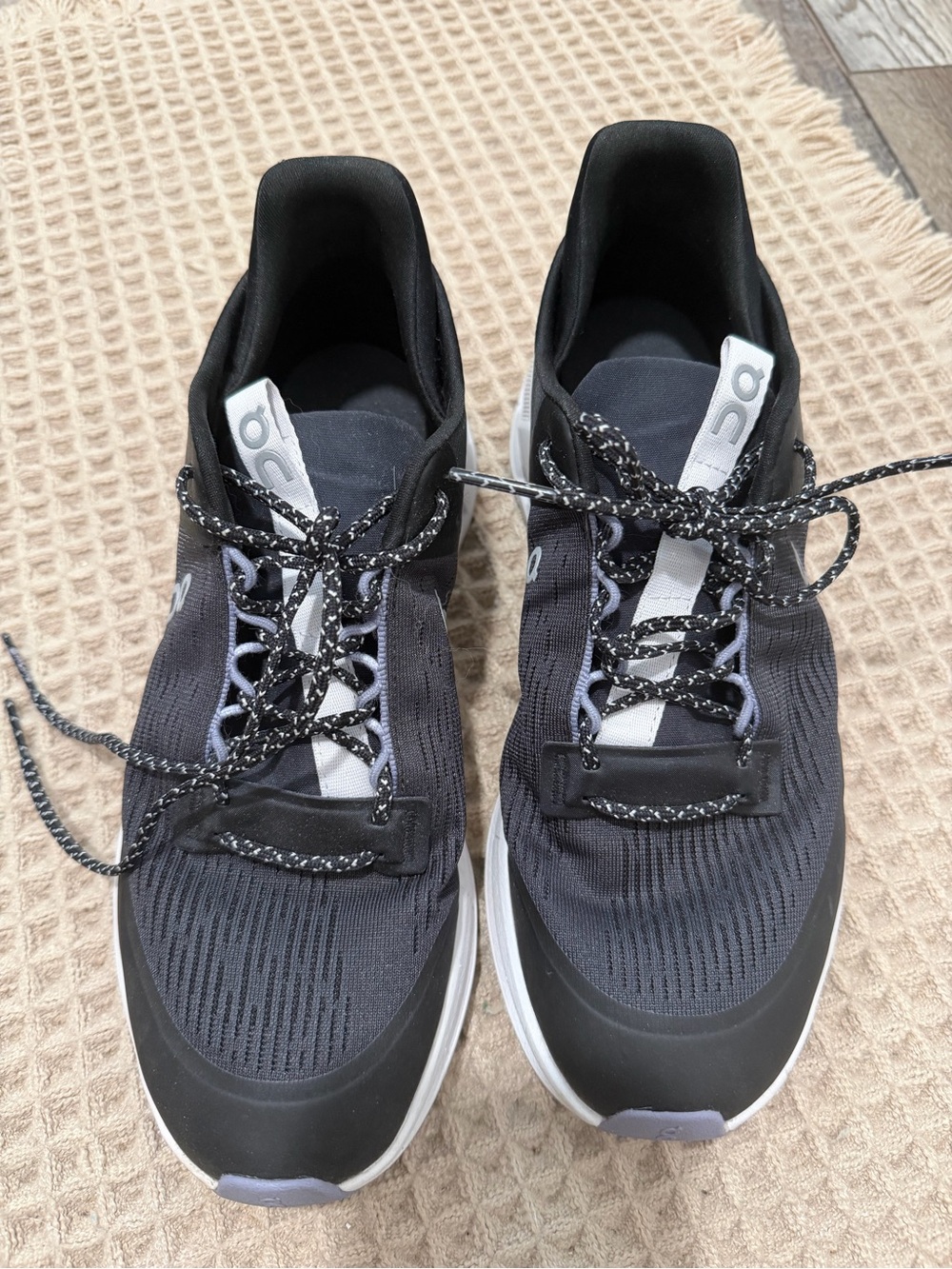 On Running women’s Black and White Performance Running Shoes